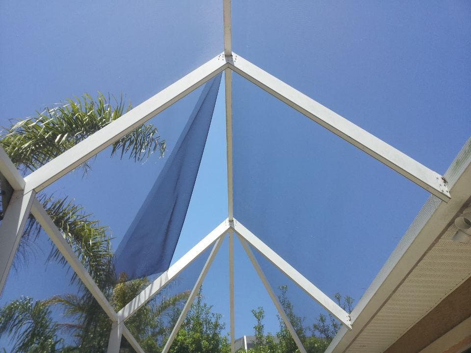 Ripped roof screen panel needing storm damage repair